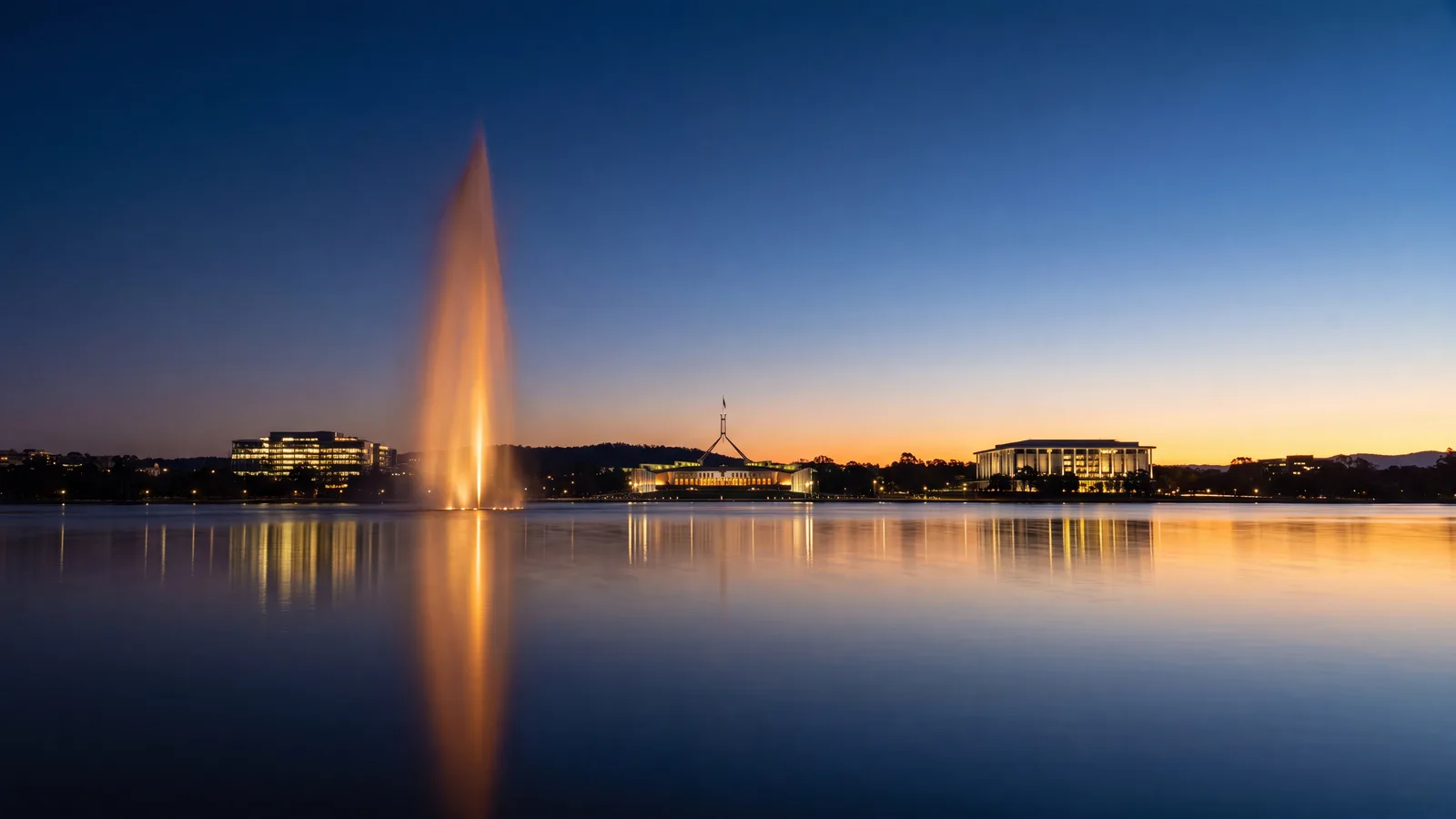 Lake Burley Griffin and the Canberra skyline at dusk