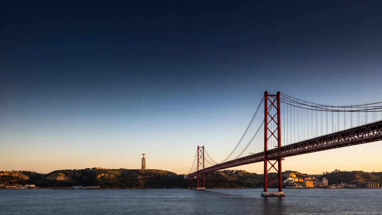 Lisbon 25 de Abril Bridge at dusk